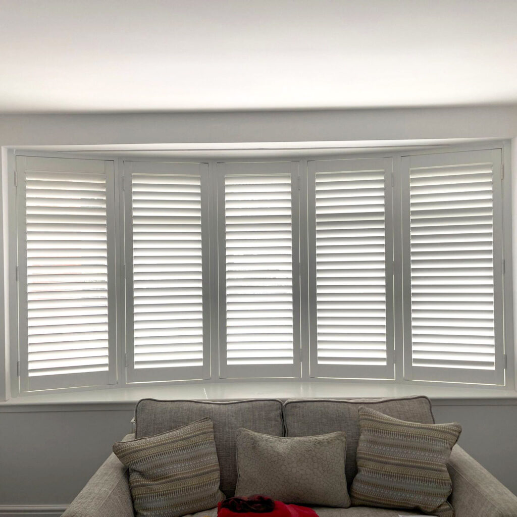 Five piece bay shutters